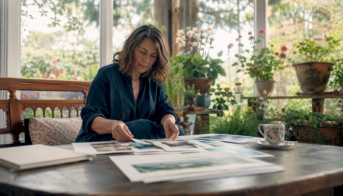 Woman browsing UK online art prints at home