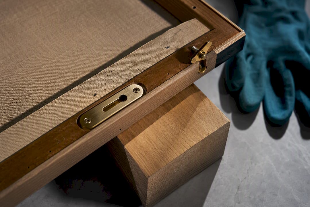 Security hanger hardware on frame back