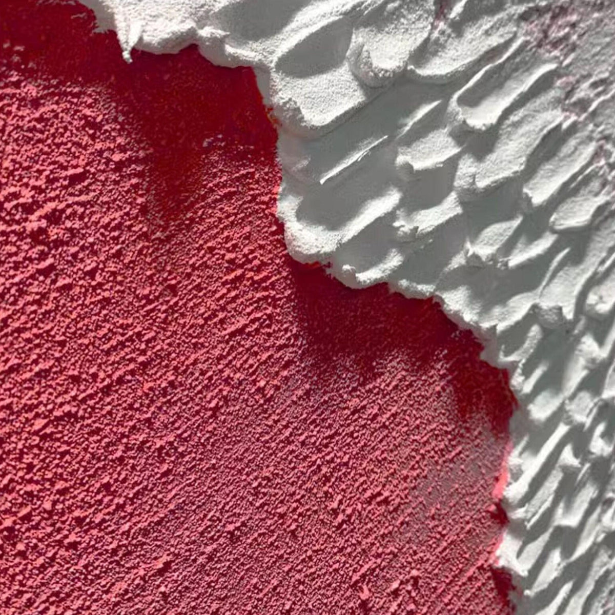 Close-up of textured handmade oil painting, showcasing rich layers and dynamic brushwork in soft pink and white tones.