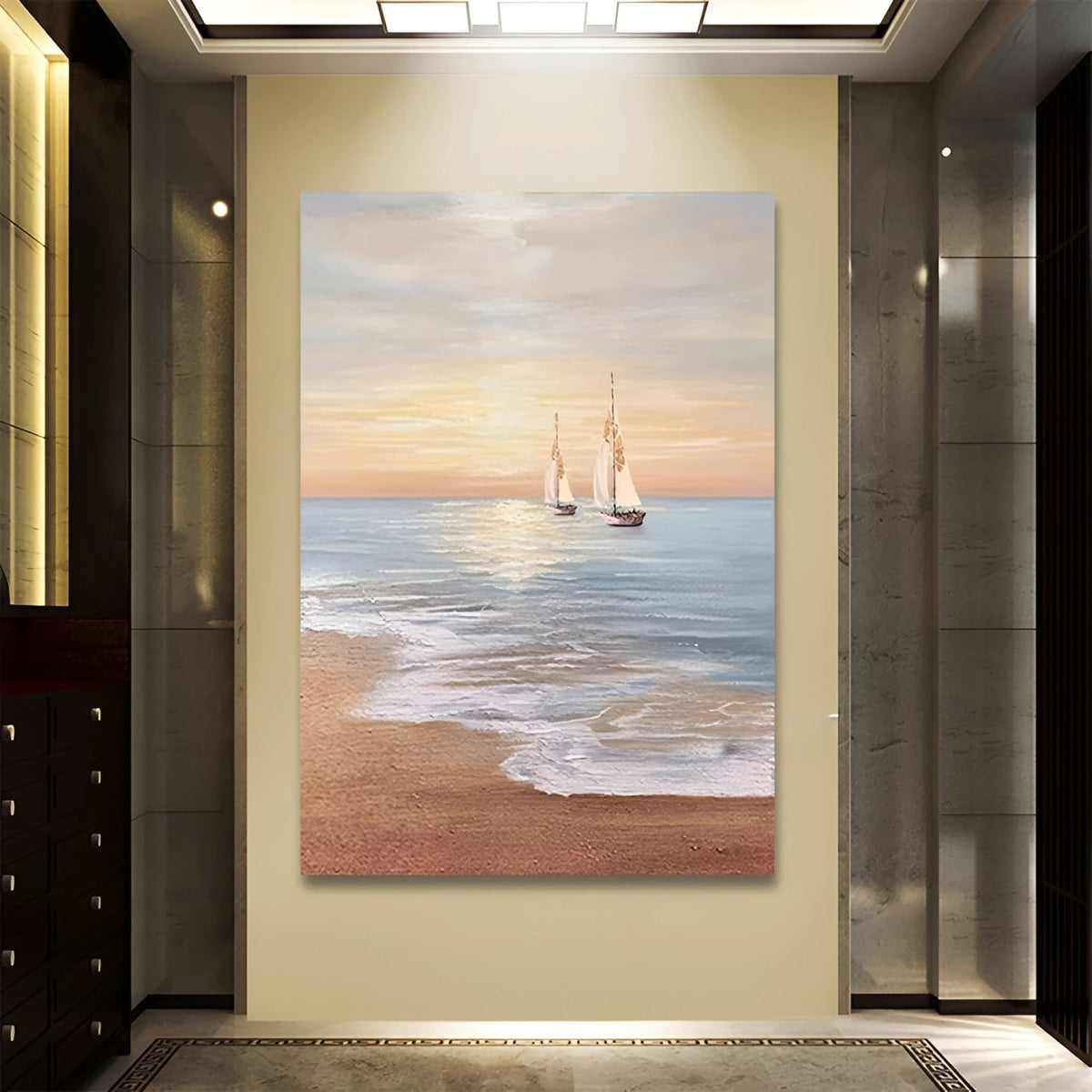 Elegant sailboats drift peacefully on calm ocean waters under a soft golden sunset, captured in a large canvas hung in a refined hallway.