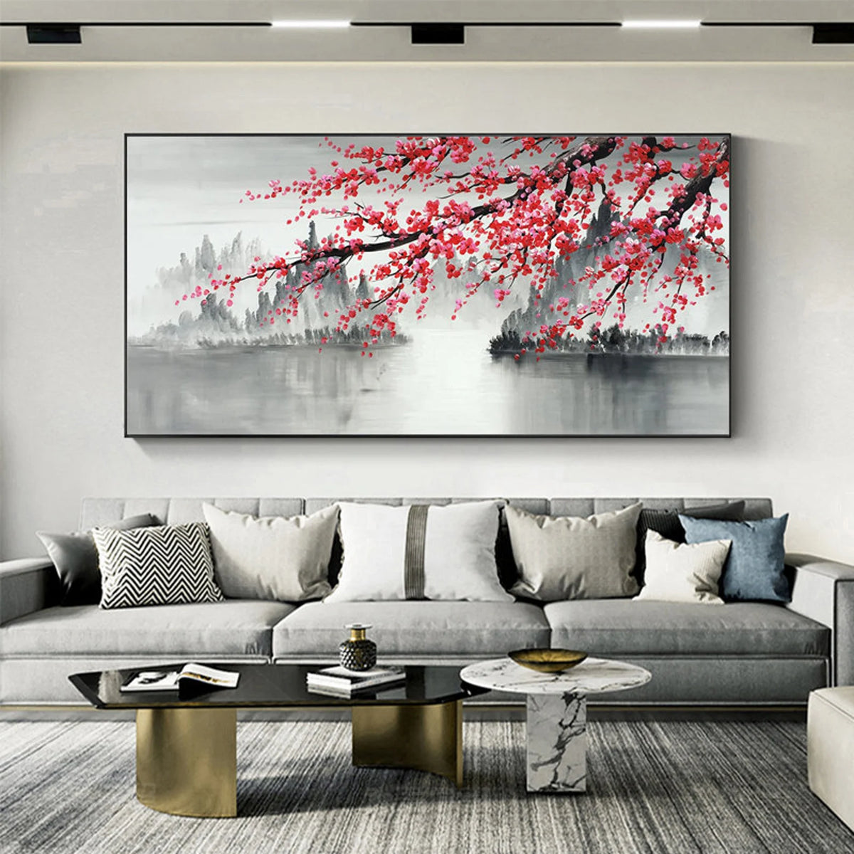 Modern living room with Japanese cherry blossom wall art above a minimalist beige sofa
