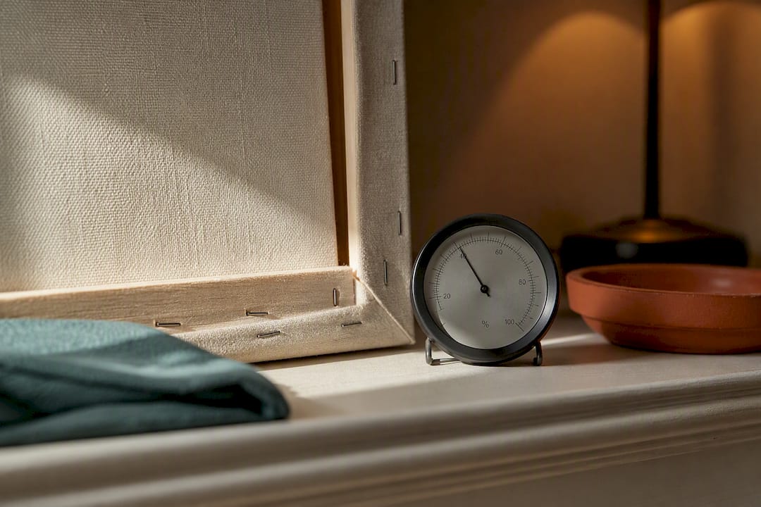 Canvas surface beside a humidity monitor