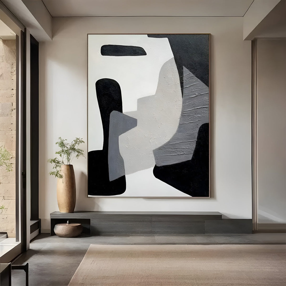 Large black and white geometric painting in modern home - High-end art for elegant living spaces.