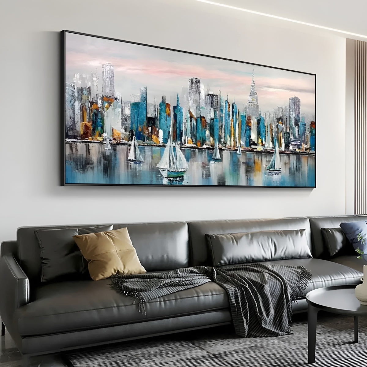 Vibrant waterfront skyline artwork in shades of turquoise, gold, and white, beautifully complementing the warm wood and neutral tones of a cozy restaurant or bar.